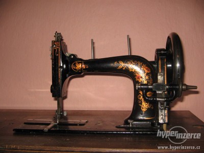 1949172-starozitny-sici-stroj-singer-2.jpg